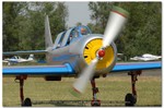2006-05-21 Voghera Avioexpo 0307 Yak 52 Marco Locatelli